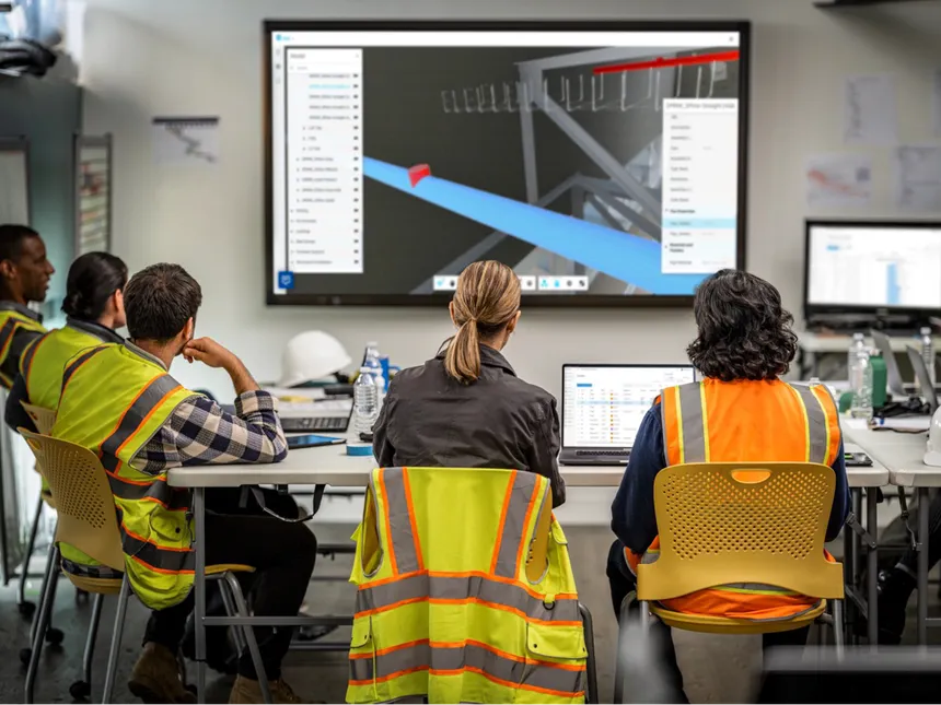 Construction professionals collaborating on a BIM model in Dubai.